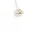 Necklace with 'MAMA' and heart pendant on a white background